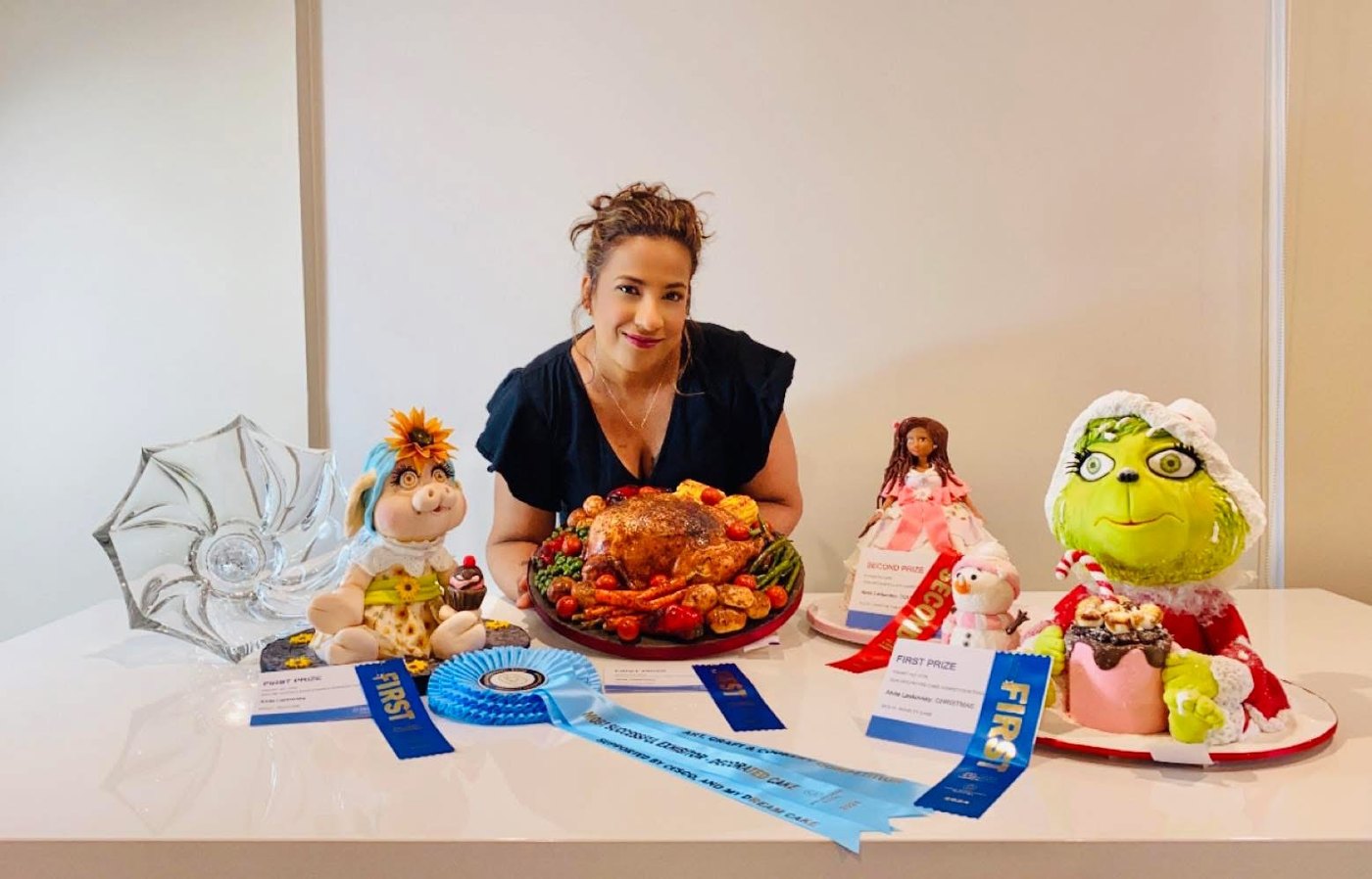Anita with award-winning cakes