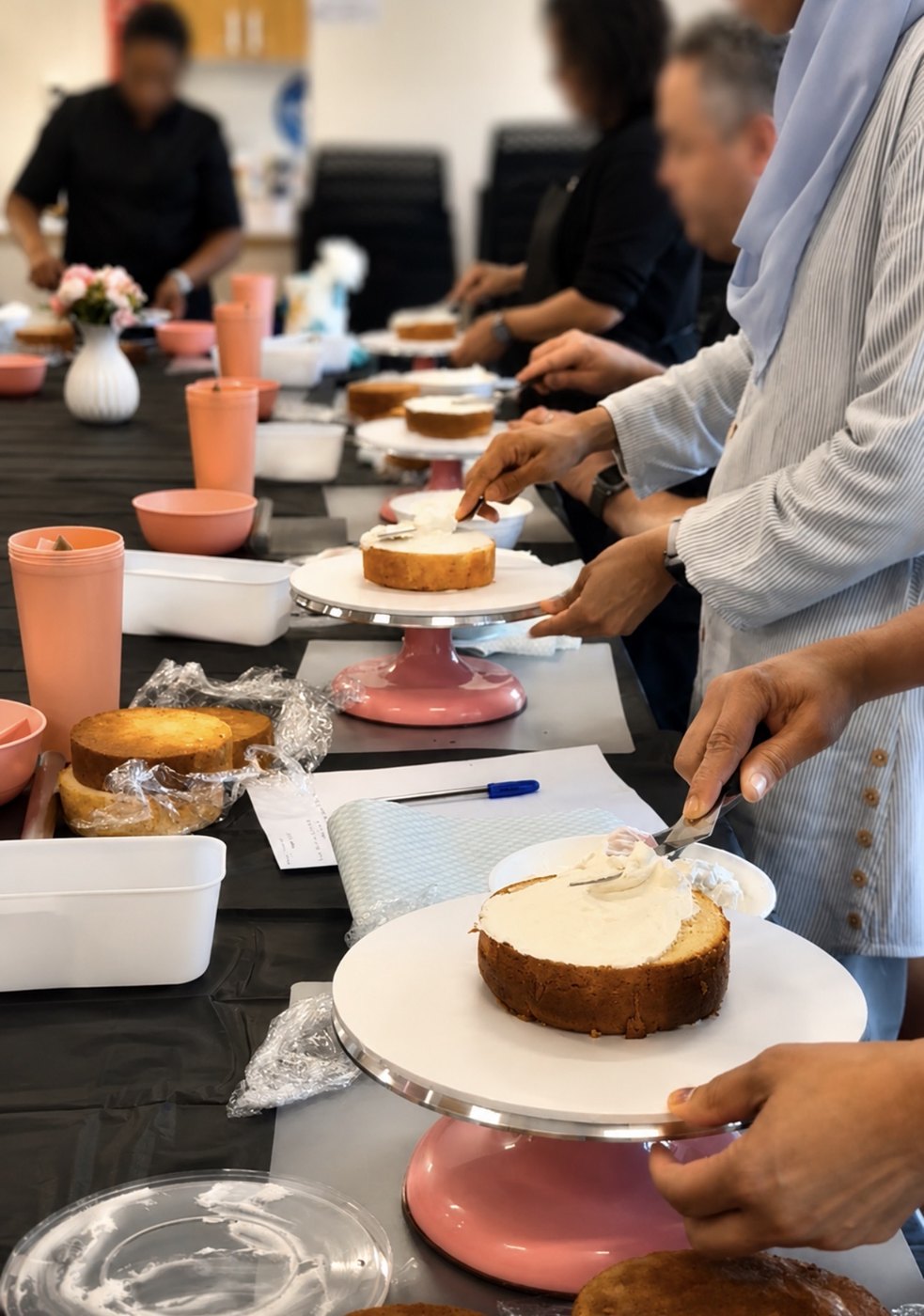 Hands-on cake decorating class table